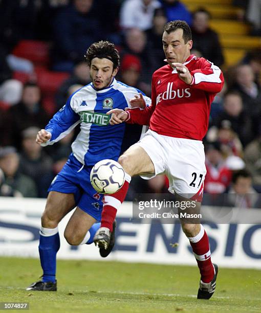 Jorge Costa of Charlton Athletic reaches the ball ahead of Corrado Grabbi of Blackburn Rovers during the FA Barclaycard Premiership match played at...