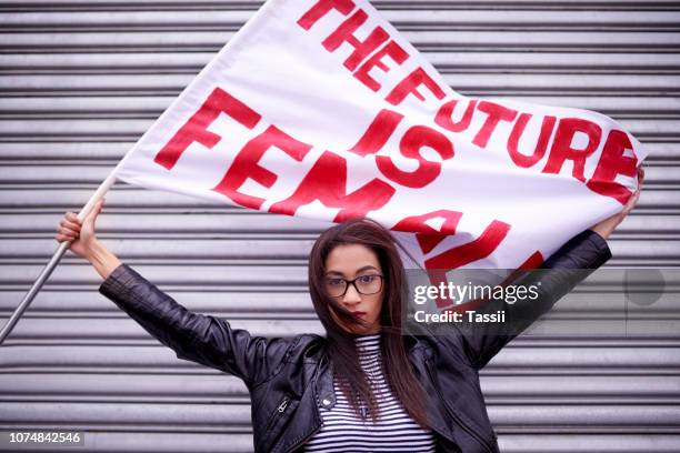 the present is female, the future is female - female activist stock pictures, royalty-free photos & images