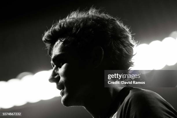 Antoine Griezmann of Club Atletico de Madrid looks on during the Group A match of the UEFA Champions League between Club Atletico de Madrid and AS...