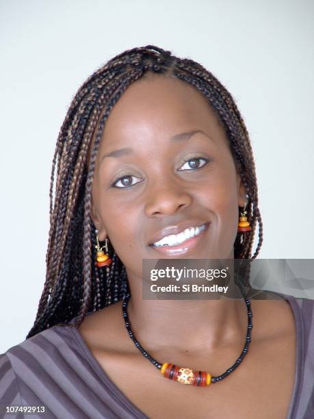 portrait of smiling lady - dark skin stock pictures, royalty-free photos & images