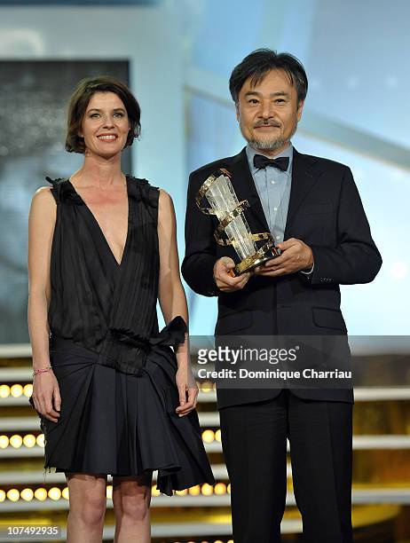 Director Kiyoshi Kurosawa awarded by French Actress Irene Jacob during the 10th Marrakech Film Festival on December 9, 2010 in Marrakech, Morocco.