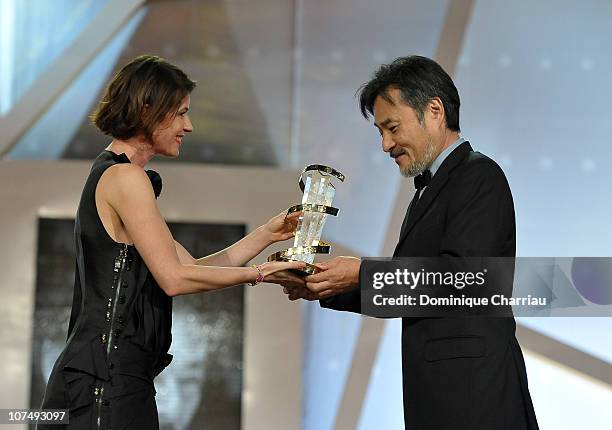 Director Kiyoshi Kurosawa awarded by French Actress Irene Jacob during the 10th Marrakech Film Festival on December 9, 2010 in Marrakech, Morocco.