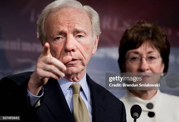 Senator Susan Collins listens while Senator Joseph Lieberman takes questions during a press conference on Capitol Hill December 9, 2010 in...