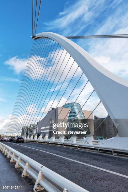 samuel beckett bridge and  convention center, dublin - dublin cityscape stock pictures, royalty-free photos & images