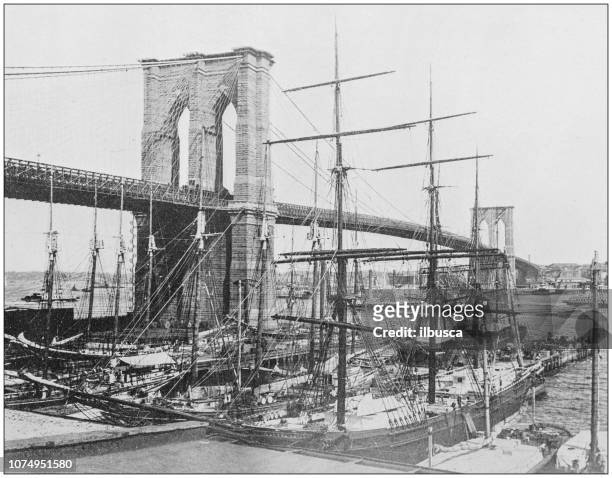 antique historical photographs from the us navy and army: brooklyn bridge, new york - archival nyc stock illustrations