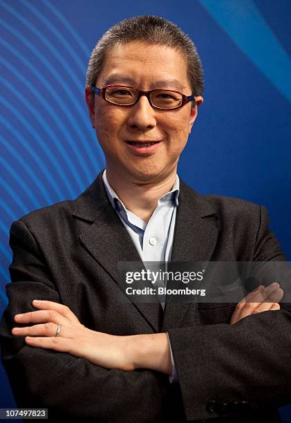 Victor Koo, chief executive officer Youku.com Inc., poses for a photograph in New York, U.S., on Thursday, Dec. 9, 2010. Youku.com Inc. Had the...