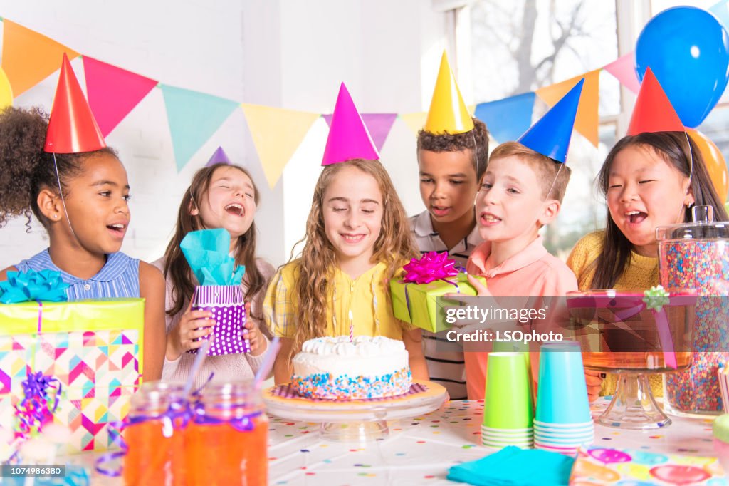 Group of children at birthday party at home