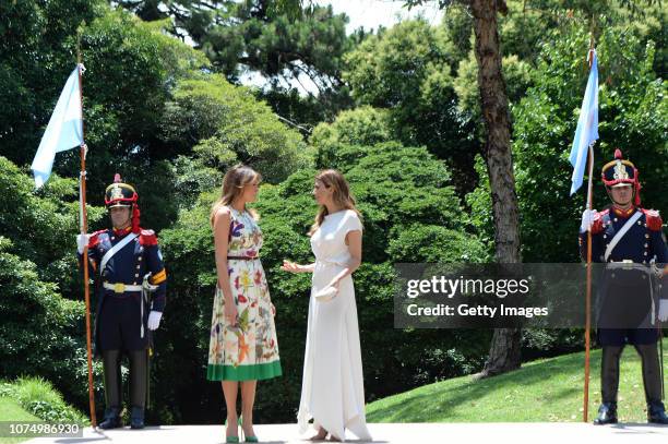 Melania Trump , US President Donal Trump's wife, greets Juliana Awada, President of Argentina Mauricio Macri's wife, during a visit to Villa Ocampo...