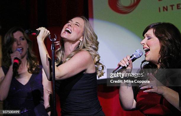 Singers Wendy Wilson, Chynna Phillips, and Carnie Wilson perform at Hudson Terrace on December 9, 2010 in New York City.