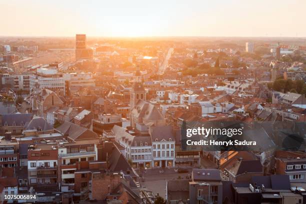 hasselt panorama at sunset - hasselt belgien stock-fotos und bilder
