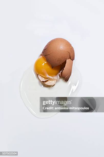 broken egg - broken egg stock pictures, royalty-free photos & images