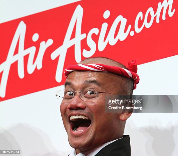 Azran Osman Rani, chief executive officer of AirAsia X Sdn., laughs during a news conference in Tokyo, Japan, on Friday, Dec. 10, 2010. AirAsia X...