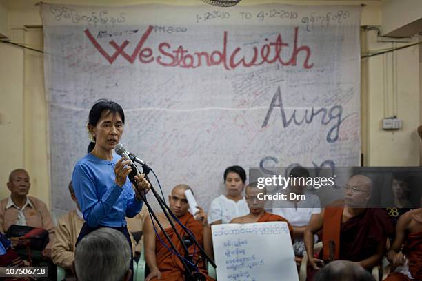 Myanmar democracy icon Aung San Suu Kyi speaks during a meeting to mark Human RIghts Day at the National League for Democracy headquarters in Yangon...