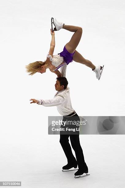Kirsten Moore-Towers and Dylan Moscovitch of Canada skate in the Pairs Short Program during ISU Grand Prix and Junior Grand Prix Final at Beijing...