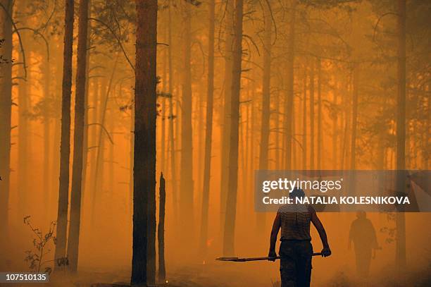 Russians try to stop fire spreading near the village Golovanovo, Ryazan region, on August 5, 2010. Russia struggled to contain the worst wildfires in...