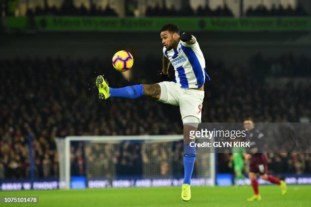 Brighton's Dutch striker Jurgen Locadia controls the ball during the English Premier League football match between Brighton and Hove Albion and...