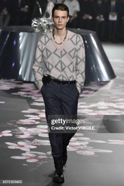 Model walks runway during the Dior Pre-Fall 2019 Men's Collection fashion show at Telecom Center on November 30, 2018 in Tokyo, Japan.