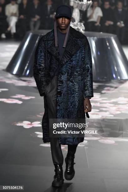 Model walks runway during the Dior Pre-Fall 2019 Men's Collection fashion show at Telecom Center on November 30, 2018 in Tokyo, Japan.