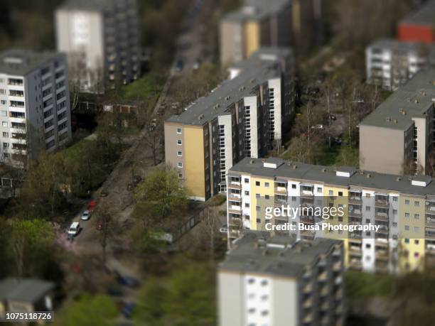 tilt-shift tecnique, aerial view of public housing projects appearing like miniature houses in berlin, germany - berlin modernism housing estates stock pictures, royalty-free photos & images