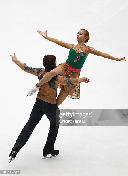 Marina Antipova and Artem Kudashev of Russia skate in the Junior Ice Dance Free Dance during ISU Grand Prix and Junior Grand Prix Final at Beijing...
