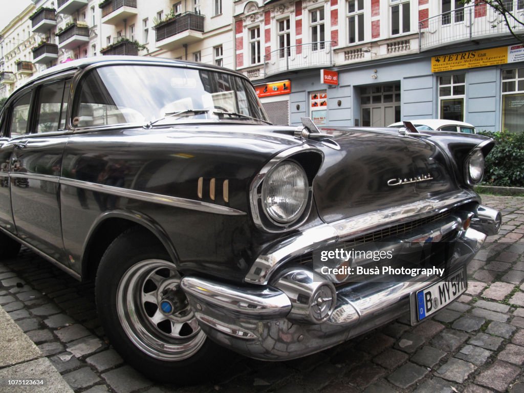 1957 black Chevrolet Biscayne Sedan in the streets of Friedrichshain, East Berlin. Berlin, Germany