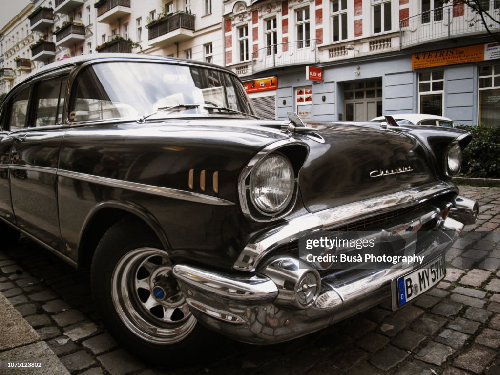 1957 black Chevrolet Biscayne Sedan in the streets of Friedrichshain, East Berlin. Berlin, Germany