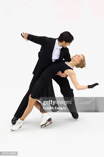 Kaitlyn Weaver and Andrew Poje of Canada skate in the Ice Dance Short Dance during ISU Grand Prix and Junior Grand Prix Final at Beijing Capital...