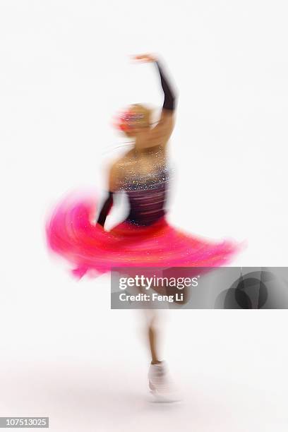 Ekaterina Bobrova of Russia skates in the Ice Dance Short Dance during ISU Grand Prix and Junior Grand Prix Final at Beijing Capital Gymnasium on...