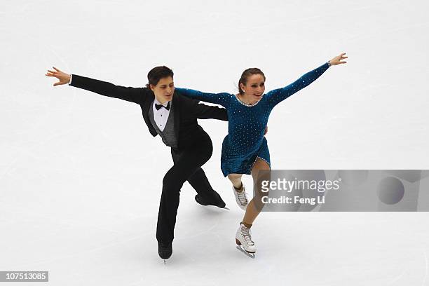 Vanessa Crone and Paul Poirier of Canada skate in the Ice Dance Short Dance during ISU Grand Prix and Junior Grand Prix Final at Beijing Capital...