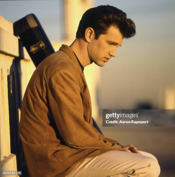 Musician Chris Isaac poses for portraits in September 1986 in Los Angeles, California.