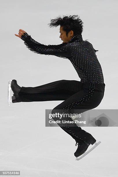 Daisuke Takahashi of Japan skates in the Men Short Program during ISU Grand Prix and Junior Grand Prix Final at Beijing Capital Gymnasium on December...