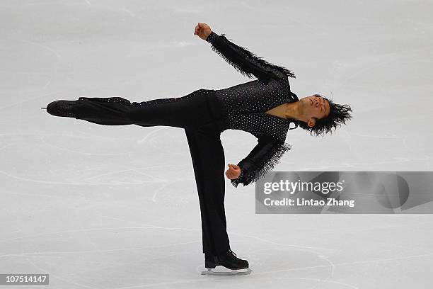 Daisuke Takahashi of Japan skates in the Men Short Program during ISU Grand Prix and Junior Grand Prix Final at Beijing Capital Gymnasium on December...