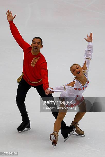 Aliona Savchenko and Robin Szolkowy of Germany skate in the Pairs Short Program during ISU Grand Prix and Junior Grand Prix Final at Beijing Capital...