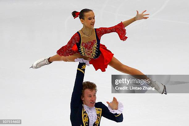 Lubov Iliushechkina and Nodari Maisuradze of Russia skate in the Pairs Short Program during ISU Grand Prix and Junior Grand Prix Final at Beijing...