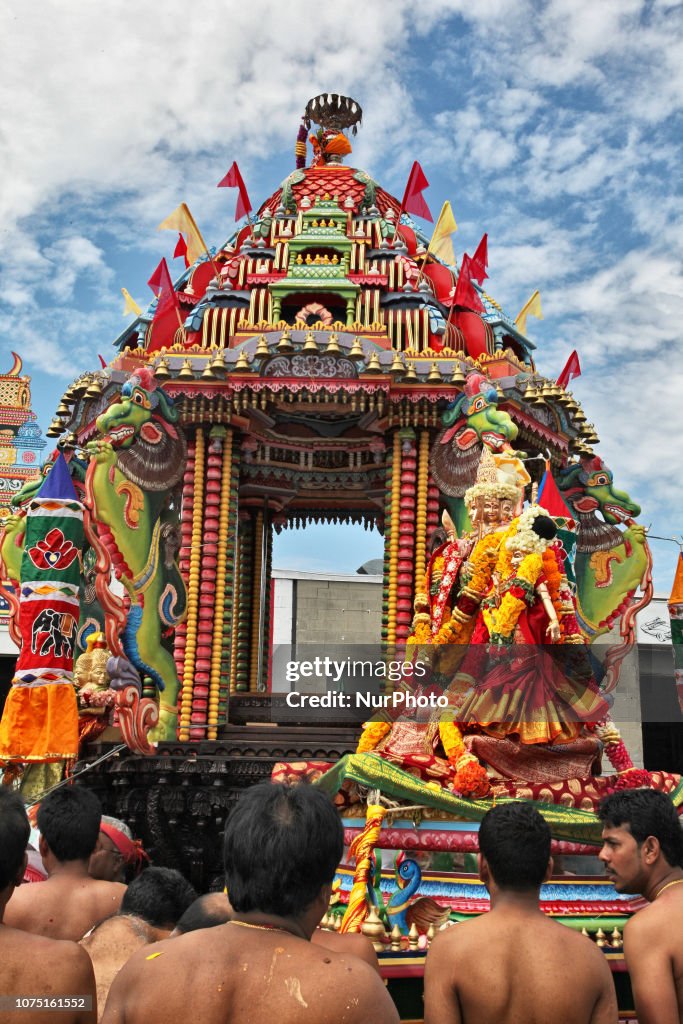 Shasti Tamil Hindu devotees place the idol of Lord Murugan in the large ...