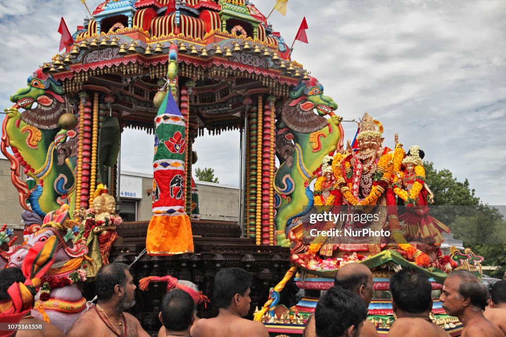 Shasti Tamil Hindu devotees place the idol of Lord Murugan in the large ...