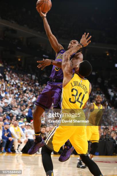 Rajon Rondo of the Los Angeles Lakers shoots the ball against the Golden State Warriors on December 25, 2018 at ORACLE Arena in Oakland, California....