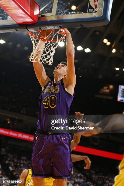 Ivica Zubac of the Los Angeles Lakers dunks the ball against the Golden State Warriors on December 25, 2018 at ORACLE Arena in Oakland, California....