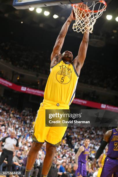 Kevon Looney of the Golden State Warriors gets the rebound against the Los Angeles Lakers on December 25, 2018 at ORACLE Arena in Oakland,...