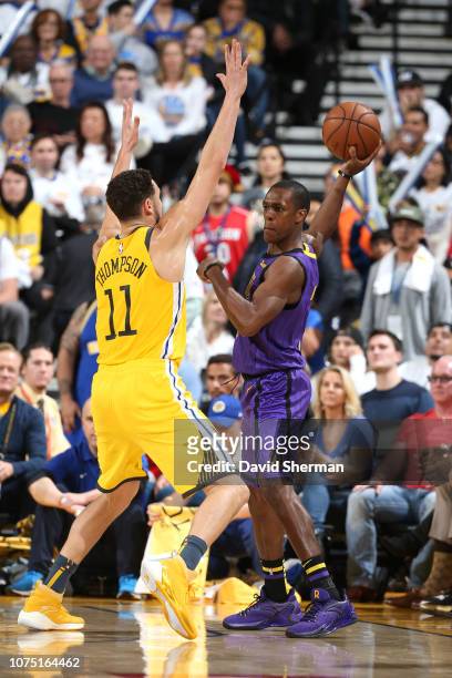 Rajon Rondo of the Los Angeles Lakers handles the ball against the Golden State Warriors on December 25, 2018 at ORACLE Arena in Oakland, California....