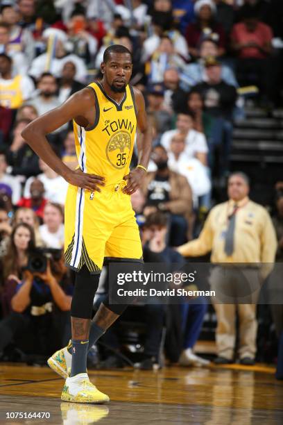 Kevin Durant of the Golden State Warriors looks on during a game against the Los Angeles Lakers on December 25, 2018 at ORACLE Arena in Oakland,...