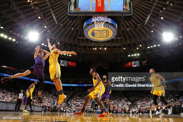 Lonzo Ball of the Los Angeles Lakers looks to pass against the Golden State Warriors on December 25, 2018 at ORACLE Arena in Oakland, California....