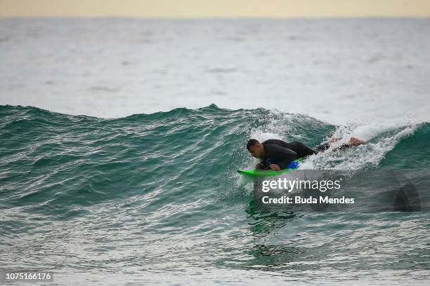 Andre Melo de Souza or Andrezinho Carioca, adapted surfer's nickname, practices at Prainha beach on December 26, 2018 in Rio de Janeiro, Brazil....