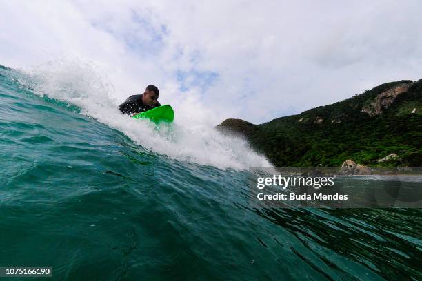 Andre Melo de Souza or Andrezinho Carioca, adapted surfer's nickname, practice at Prainha beach on December 26, 2018 in Rio de Janeiro, Brazil....