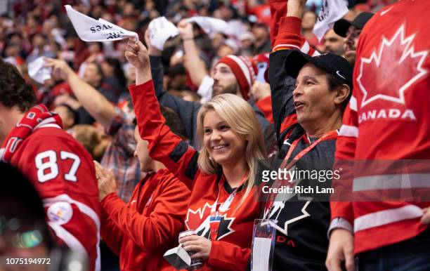 Canadian hockey fans celebrate Team Canada's 14-0 win over Denmark in Group A hockey action of the 2019 IIHF World Junior Championship action on...