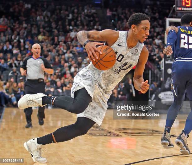 DeMar DeRozan of the San Antonio Spurs drives against the Denver Nuggets at AT&T Center on December 26, 2018 in San Antonio, Texas. NOTE TO USER:...