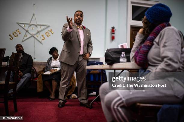 James Dixon of the Baltimore Police speaks during the Mothers of Murdered Sons and Daughters United monthly meeting at St. John Alpha & Omega...