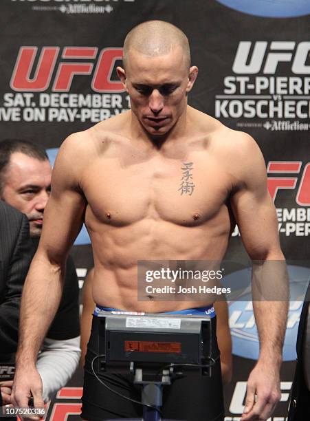 Welterweight Champion Georges St-Pierre weighs in at 170 lbs at the UFC 124 Weigh-in at the Bell Centre on December 10, 2010 in Montreal, Quebec,...