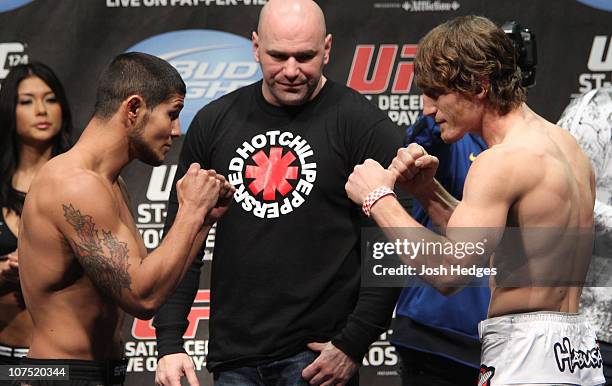 Lightweight opponents Joe Stevenson and Mac Danzig face off as UFC President Dana White looks on at the UFC 124 Weigh-in at the Bell Centre on...