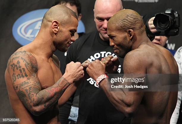 Welterweight opponents Thiago Alves and John Howard face off as UFC President Dana White looks on at the UFC 124 Weigh-in at the Bell Centre on...